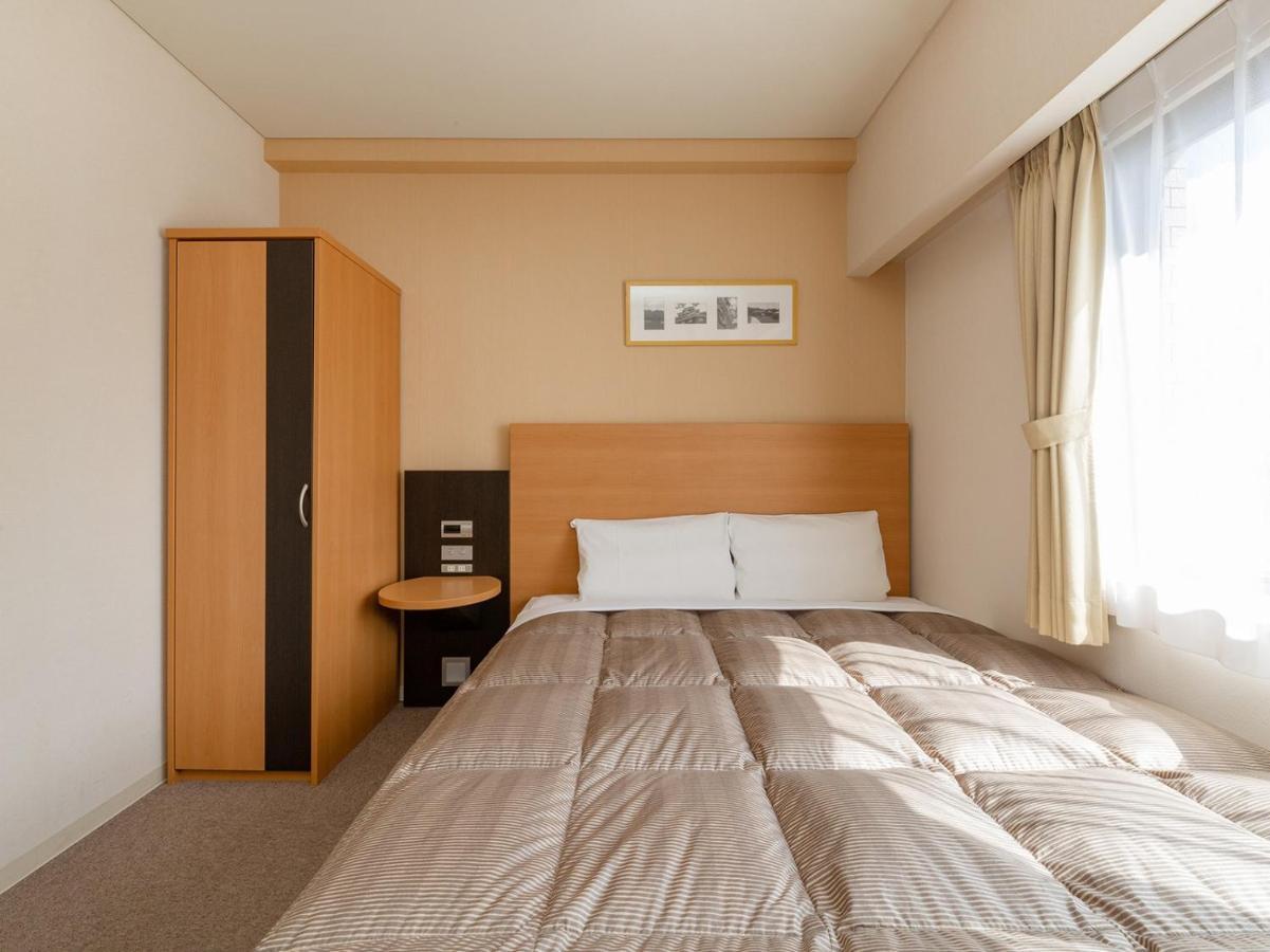 The Onefive Okayama Hotell Exteriör bild